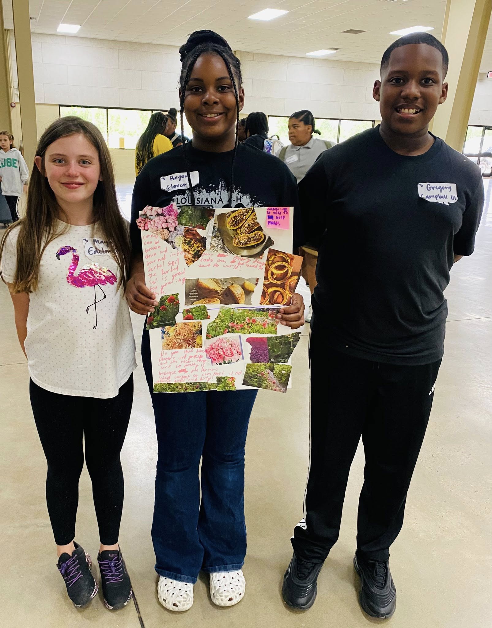 Two girls and a boy posing with a picture collage.